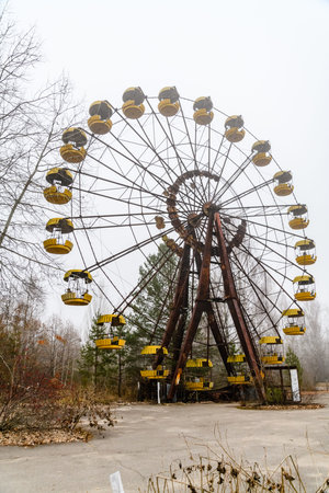 Ferris wheel in abandoned amusement park in ghost town Pripyat, Ukraine. Chornobyl exclusion zone