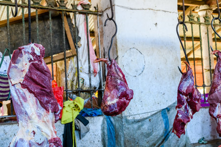 Pieces of fresh raw meat at food market at Zanzibar