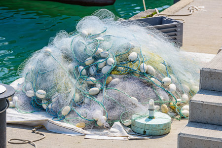 Tangled fishing net on pier. Fishing industryの写真素材