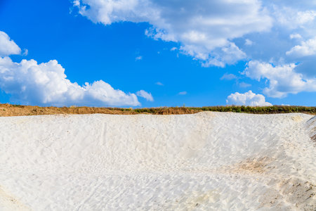 Pile of white sand at abandoned quarryの写真素材