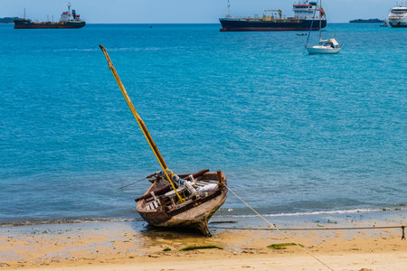 Traditional wooden fishing boat at the Zanzibar island, Tanzania