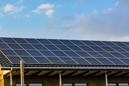 Solar panels on the roof of the residential house. Clean energy. Ecological concept