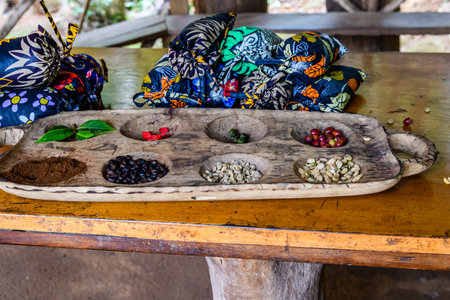 Different coffee beans on wooden table. Stages of coffee preparationの写真素材