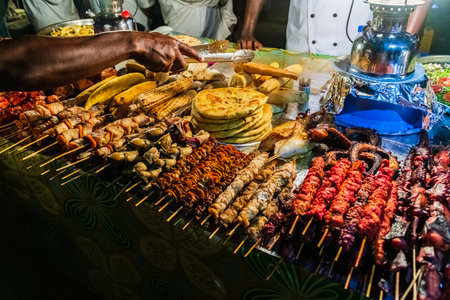 Different seafood for sale at Forodhani gardens in Stone town at night. Zanzibar, Tanzaniaの写真素材