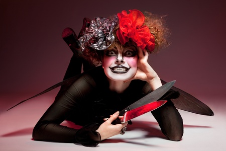 woman mime with knifeの写真素材