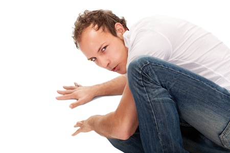 Portrait of young surprised man gesturing.の写真素材