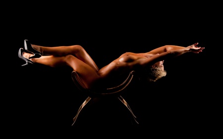 young naked women on black backgroundの写真素材