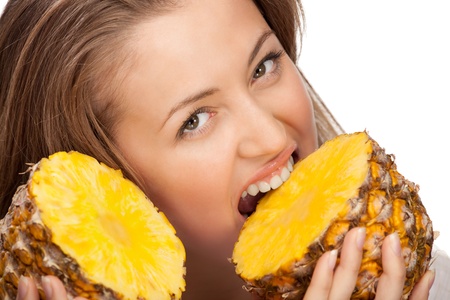 lovely blonde with pineappleの写真素材