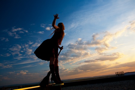 pretty witch with broomの写真素材