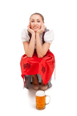 Bavarian girl isolated over white backgroundの写真素材