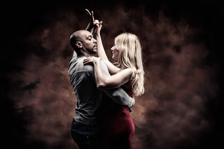 Young couple dances Caribbean Salsaの写真素材