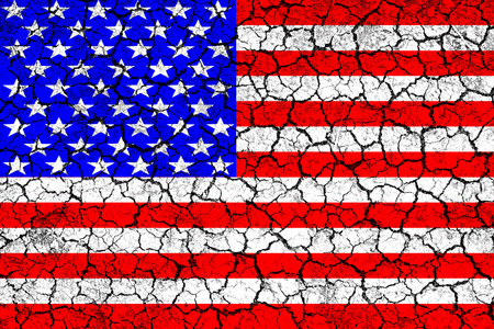 Flag of USA painted on cracked wall. Political concept. Old texture. Vintage design. USA flag on cracked earth. Famine and drought. Natural disaster. Front view.の写真素材