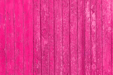 Old shabby wooden planks with cracked color paint, background old panels. Color-Peel wood texture. Fracture wall. Ruined floor. The texture of the destroyed wooden wall. Decrepit fence.の写真素材