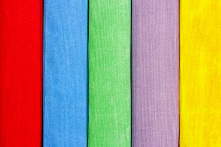 Books on the shelf. The texture of multi-colors textbooks.の写真素材