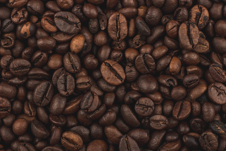 Roasted coffee beans. Background, close-up view.の写真素材