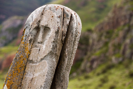 Ancient deer stone at the Altai region, Russia. Deer stones (also known as deer stones) are ancient megaliths carved with symbols that can be found in Siberia and Mongolia.の写真素材