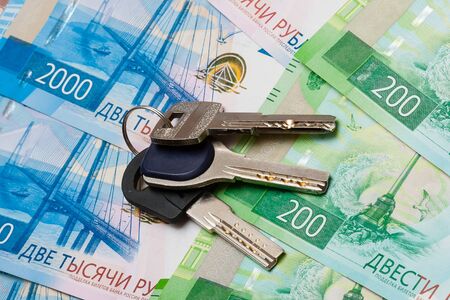 Keys are on bills with face value of 200 and 2000 rublesの写真素材