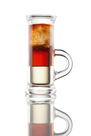 Multi-layered alcohol shot isolated on whiteの写真素材
