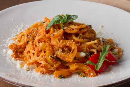 Pasta with vegetables on plateの写真素材
