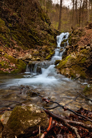Waterfall in a forest in Slovak Paradise, Slovakia