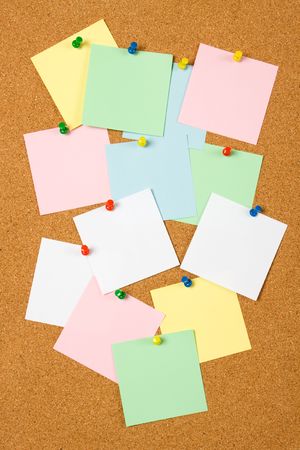 Cork notice board with blank paper notesの写真素材