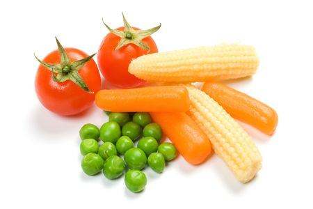 Tomato, carrot, green peas and baby corn isolated on whiteの写真素材