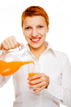 Smiling woman with orange juice isolated on whiteの写真素材