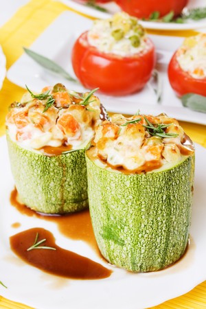 Zucchini stuffed with vegetables and sour creamの写真素材