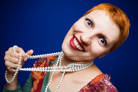 Portrait of beautiful woman with pearl necklaceの写真素材