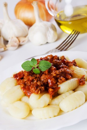 Gnocchi di patata bolognese, italian potato noodleの写真素材