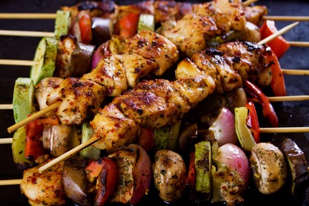 Grilled chicken meat and vegetable on a skewerの写真素材