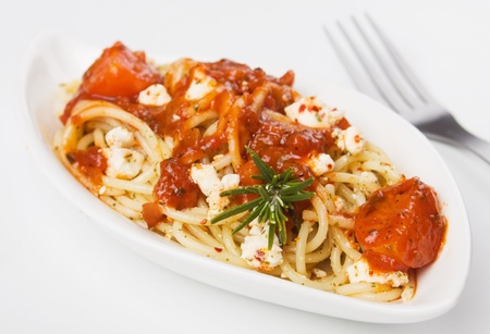 Italian spaghetti pasta with cheese and tomato sauce, not isolatedの写真素材