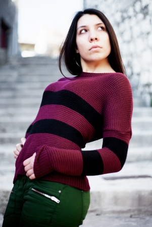 Beautiful girl in autumn outfit, selective focus imageの写真素材