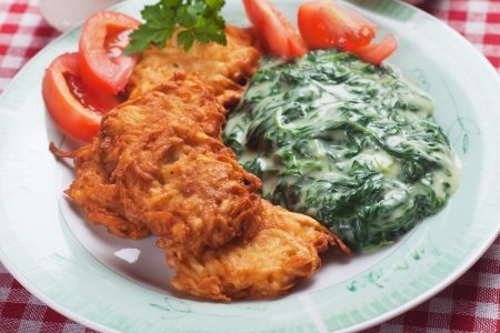 Latke, potato pancakes with creamy spinach mashの写真素材