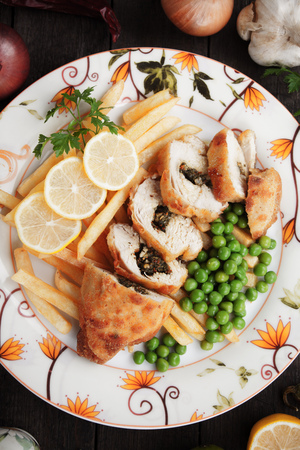 Chicken kiev stuffed with butter and herbsの写真素材