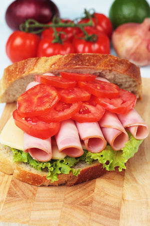 Baloney or Bologna sausage sandwich with tomato and lettuceの写真素材
