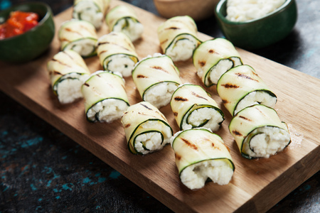 Grilled zucchini rolls filled with fresh cottage cheeseの写真素材