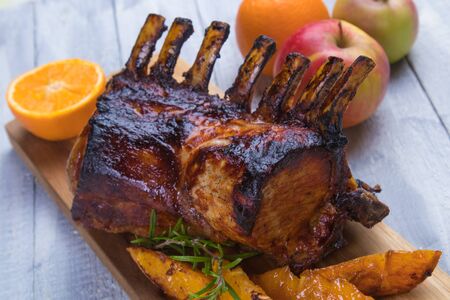 Roasted rack of pork, pork loin roast with frenched ribsの写真素材