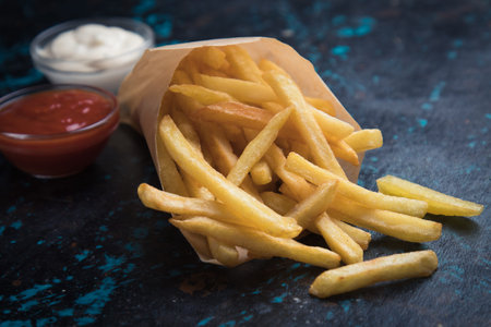 French fries, deep fried potato chips with ketchup and mayonnaise