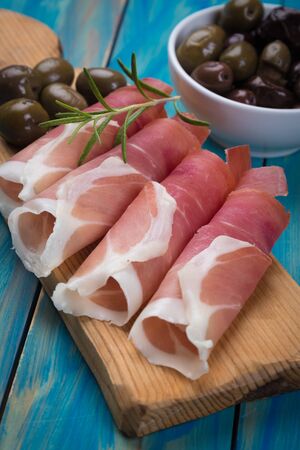 Slices of cured ham similar to italian prosciutto or spanish jamon ibericoの写真素材
