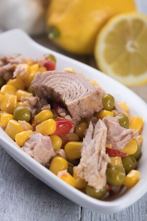Healthy and nutritive tuna salad with corn,  vegetables and beansの写真素材