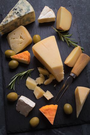 Cheese platter with blue, aged, yellow and white cheesesの写真素材