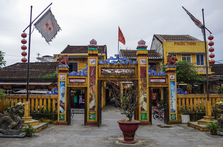 Hoi An, Vietnam - January  7, 2015: View of gate from yard of ancient pagoda in Hoi An old town, Vietnamのeditorial素材