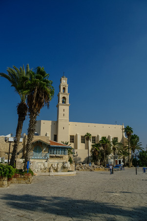 St. Peter's Church. The bell tower with clock of the Church. Sunset light in Jaffa, Israelのeditorial素材