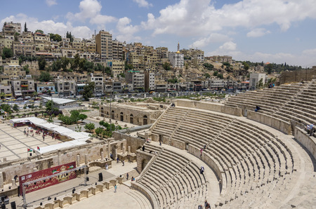 Amman, Jordan -May 28, 2016: Roman amphitheatre in downtown with Amman cityscape at backgroundのeditorial素材