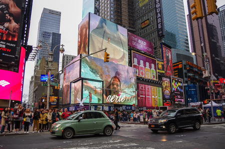 New York city,USA - July 21,2014: The Times Square at evening  in New York, Times Square is major commercial intersection in New york and one of the most visited tourist attractions in the world.のeditorial素材