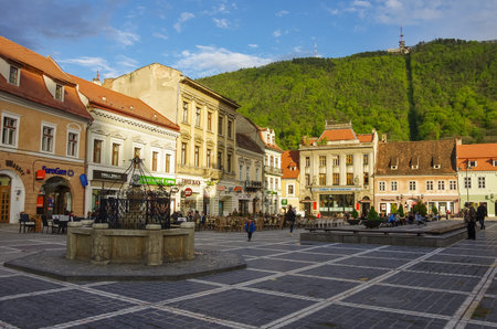 Brasov, Transylvania, Romania- April 29, 2015: Brasov Council Square is historical center of city...