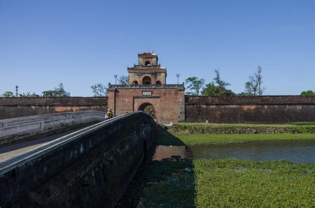 Hue,Vietnam- January  5, 2015: The gate in to citadel (emperors palace), and bridge over Imperial Palace moat, Hue,Vietnamのeditorial素材