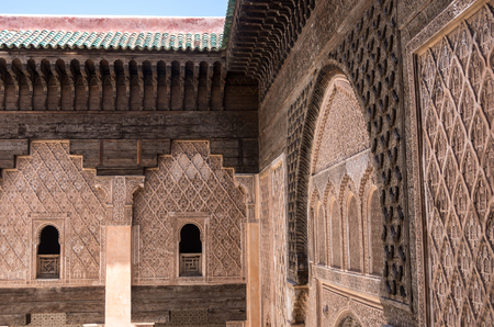 Carving of wood and stone detail. Medersa of Ben Youssef, Marrakech,Moroccoのeditorial素材