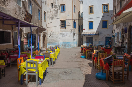 Essaouira, Morocco - May  6, 2017 :  Street cafe on square with colorful old houses in medieval medina of Essaouira, Moroccoのeditorial素材